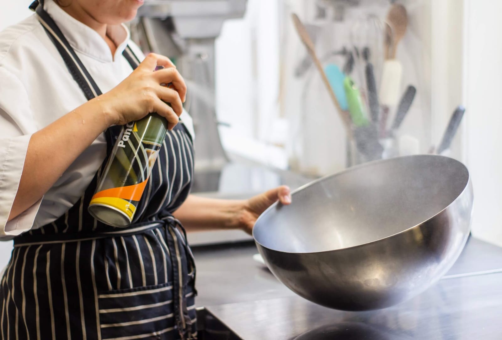 A chef working in a restaurant kitchen