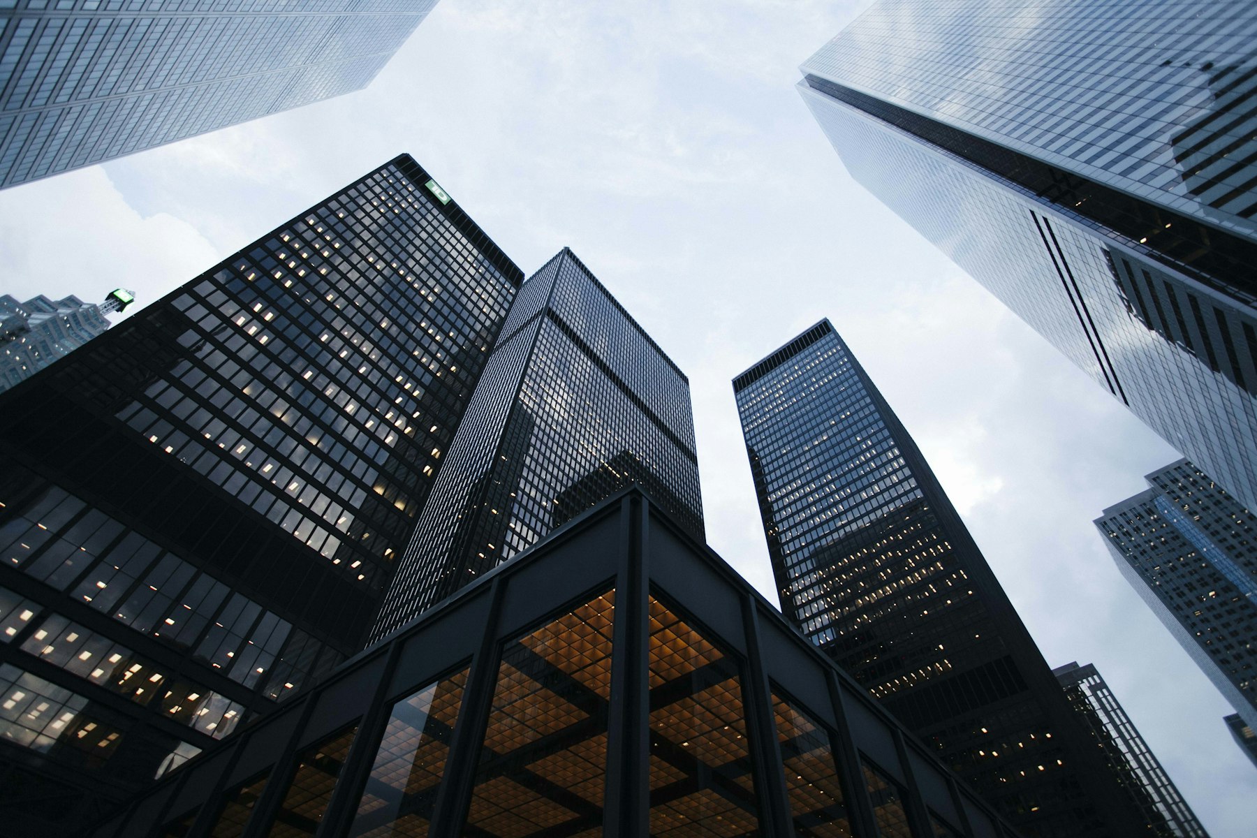 Office towers seen from the street, looking up